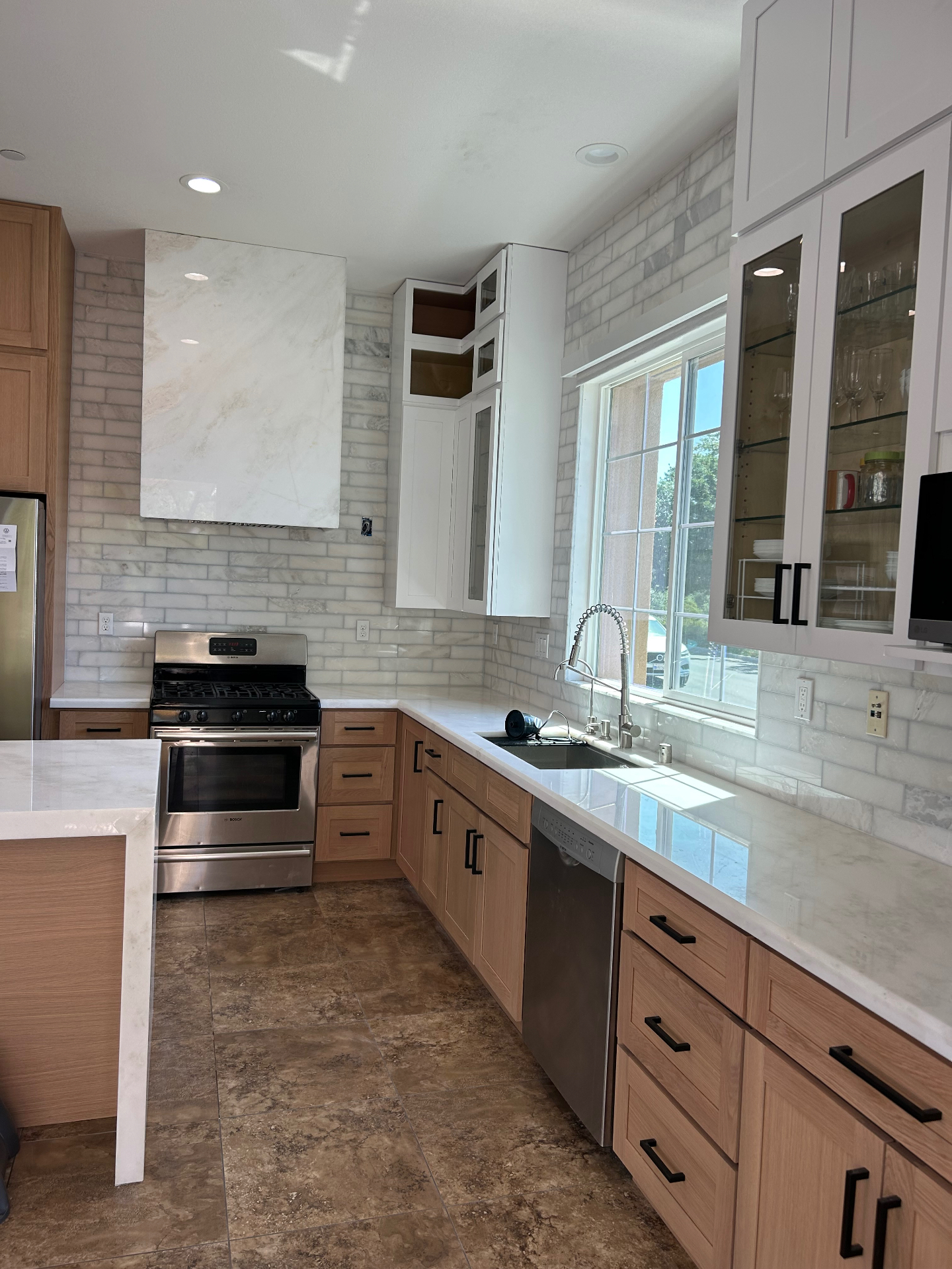 Finished kitchen backsplash with stove