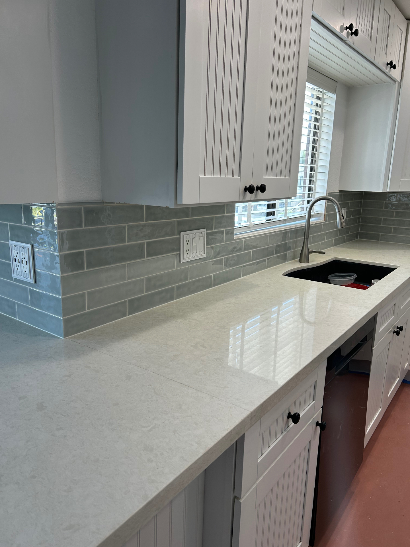 Blue mosaic kitchen backsplash