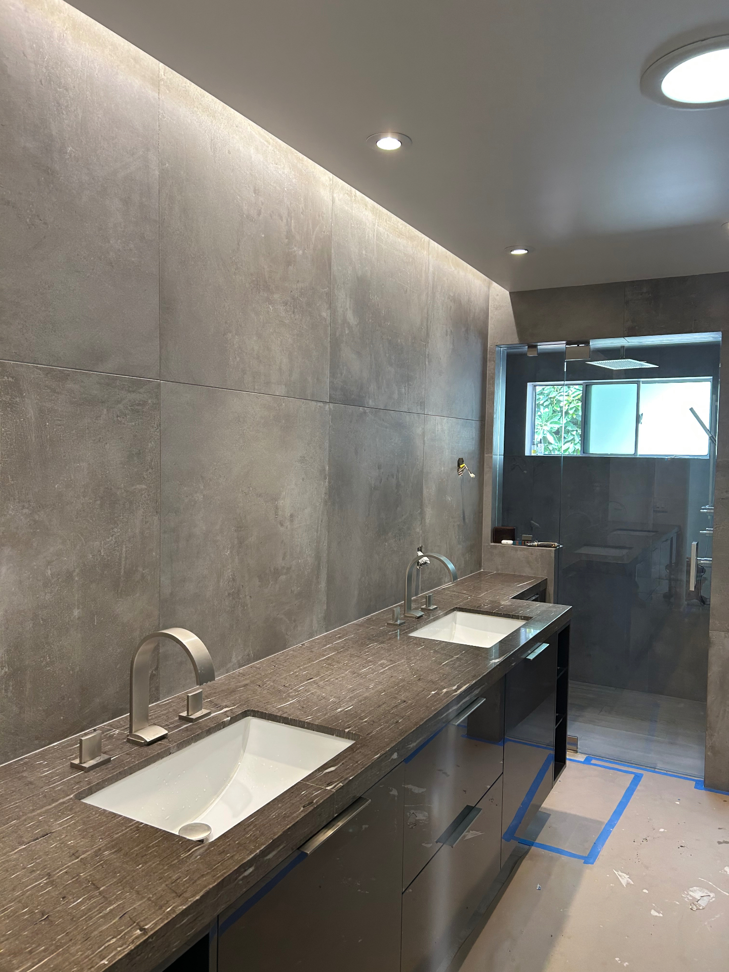 Large-format concrete-look decorative tile wall